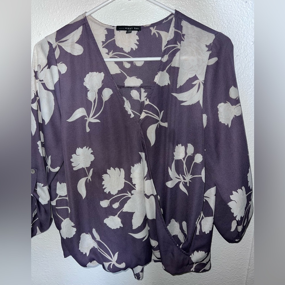 West Kei brand. Size Medium. Purple with white floral design.